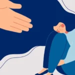 تصویری انیمیشنی که در آن خانمی با ناراحتی زانوهای خود را بغل کرده و سرش را روی زانوهایش گذاشته است
